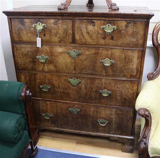 A George II walnut chest of drawers W.103cm